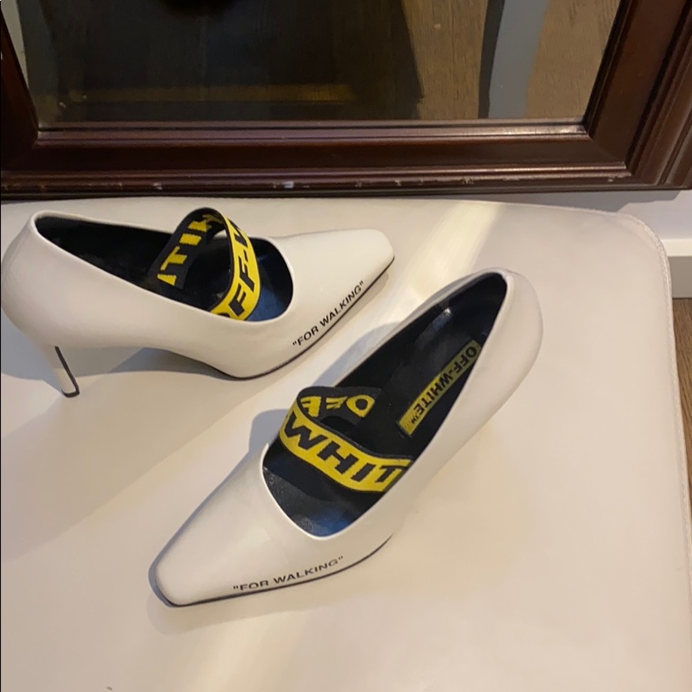 Grained leather heels in off white. Approx. 4 inch